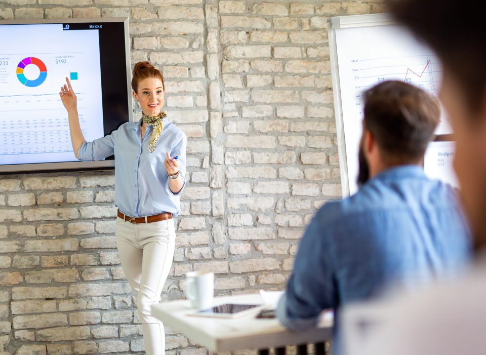 Group of young successful business people in business training course in office. Business education concept